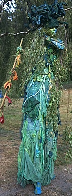 beautiful green stilt walker